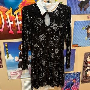 Knee length dress w/ long sleeves and a button on collar